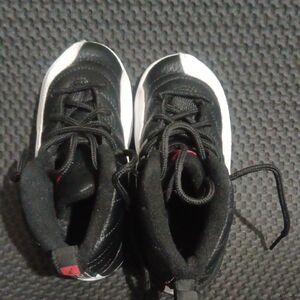 Jordan Kids Black and White High-Top Sneakers with Red Accent